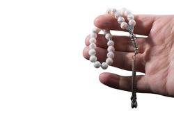 Hand with prayer beads isolated on white background.