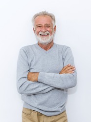 Portrait of healthy happy smile senior elderly caucasian old man face with arm crossed isolated on white. Golden age grand father healthcare cheerful lifestyle, freedom relax retirement concept 