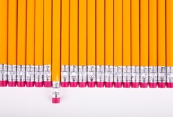 Row of pencil erasers arranged in parallel, back to school