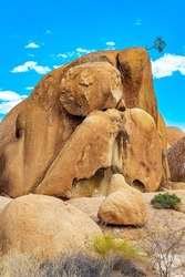 Africa. Namibia. Spitzkoppe is a picturesque rock massif in Namibia. Picturesque huge rounded boulders in the middle of the endless Namibian desert. Adventurous journey to an exotic country 