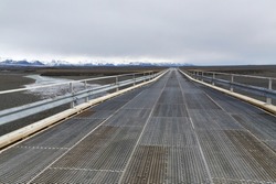 Single-lane bridge in Iceland along the Ring Road with wider spots where cars can pass each other
