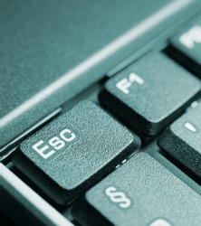 Detail of a computer keyboard focused on the escape key