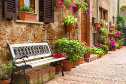 Beautiful street decorated with flowers in Italy