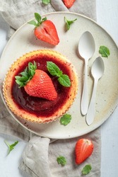 Tasty strawbery cheesecake made of fresh berries. Strawberry cheesecake. Sweet and fruity strawberry cheesecake.