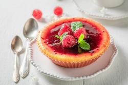 Homemade strawbery cheesecake made of fresh berries. Strawberry cheesecake. Sweet and fruity strawberry cheesecake.