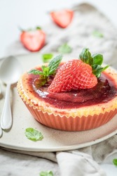 Homemade strawbery cheesecake with fresh fruits. Strawberry cheesecake. Sweet and fruity strawberry cheesecake.
