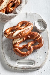 Crusty and fresh pretzels as a salty snack. Freshly baked salty pretzels.
