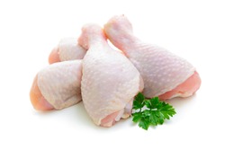 Raw chicken legs on white background isolated