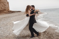 Wedding couple at the beach near the sea