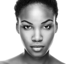 Face of an young black beauty in black and white