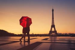 couple travel to Paris, silhouette of lovers kissing near Eiffel tower, romantic escape destination for valentines day
