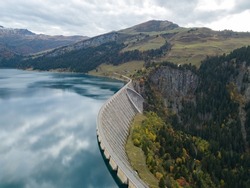 beautiful water dam in Alps in Europe, green energy