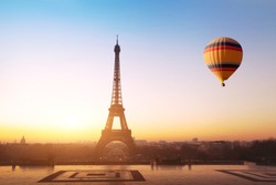 travel concept, beautiful view of hot air balloon flying near Eiffel tower  in Paris, France, tourism in Europe