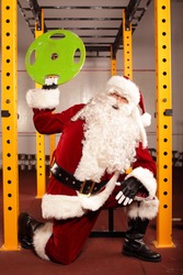Santa Claus physical condition training before Christams time in gym
