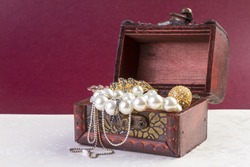 Jewelry Concept - Concept or Metaphor for selling old pearls and gold jewelry for cash 