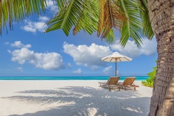 Amazing vacation beach. Chairs on the sandy beach near the sea. Summer romantic holiday concept for tourism. Tropical island landscape. Tranquil shore scenery, relax sand seaside horizon, palm leaves