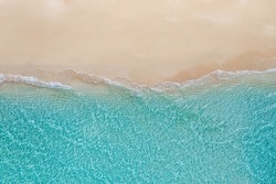 Relaxing aerial beach, summer vacation tropical Mediterranean landscape banner. Waves surf amazing blue ocean lagoon, sea shore coastline. Beautiful aerial drone top view. Peaceful beach, seaside surf