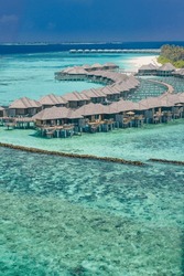 Maldives paradise island. Tropical aerial landscape, seascape, water villas bungalows with amazing sea and lagoon beach, tropical nature wave breaker. Exotic tourism destination banner summer vacation