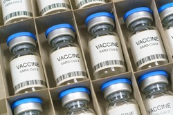 Coronavirus COVID-19 vaccine. SARS-Cov-2 Ncov-2019 vaccine ampoules  in a box.