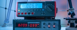 Electronic measuring instrument. Function generator and  Multimeter Instrument for measuring voltage