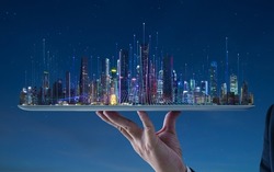 Waiter hand holding an empty digital tablet with city and abstract dot point connect with gradient line and aesthetic Intricate wave line design. Smart city concept .