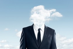 The head of the businessman is covered with clouds , business concept .