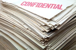 heap of confidential documents of role
