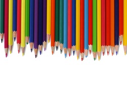 Close up of color pencils with different color over white background