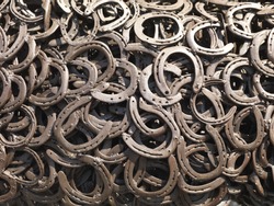  a bunch of welded horseshoes for luck