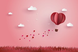 illustration of love and valentine day,Origami made hot air balloon flying over grass with heart float on the sky.paper art and  digital craft style.
