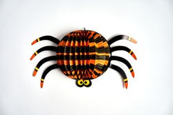 Halloween spider orange black paper craft white background isolated 