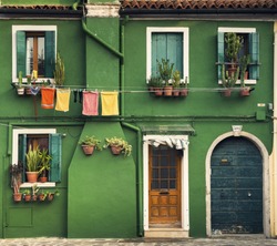 Colorful houses taken on Burano island, Venice, Italy in summer time.