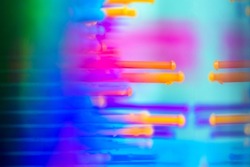Details of rainbow express sculptor for stimulation of imagination and creative thinking. Blurred multi-colored abstract background macro