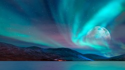 Northern lights (Aurora borealis) in the sky with super full moon - Tromso, 
 Norway 