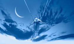 The girl riding a swing on the space on a crescent moon at night 