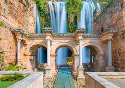View of Hadrian's Gate in old city of Antalya with duden waterfall - Turkey