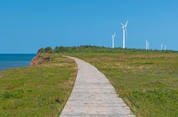 Wind Farm Along a Coatal Boardwalk on the North Cape Trail on Prince Edward Island