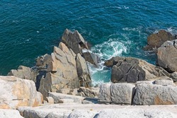 Jagged Rocks Below a Steep Ocean Cliff in Cape Breton Highlands National Park in Nova Scotia