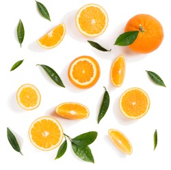Background made of orange fruits and green leaves isolated on a white background. Top view.