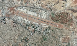 Satellite view of Kabul airport, Hamid Karzai International Airport, houses, streets and buildings. Evacuation of refugees, Afghanistan. Element of this image is furnished by Nasa