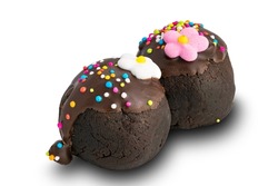 View of choc balls or chocolate balls topping with multicolored rainbow sprinkles and colored sugar flower on white background with clipping path.