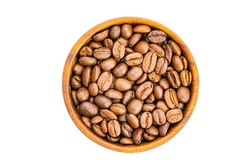 Top view or flat lay pile of brown roasted aromatic coffee beans in wooden bowl isolaten on white background with clipping path.