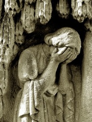 crying stone/photo of a sad woman statue