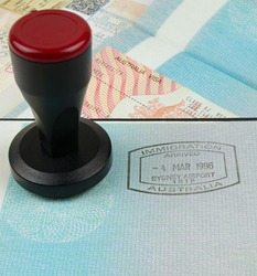 Australian immigration stamp and visa with a stamping tool