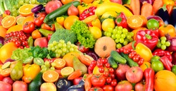 Wide background made of vegetables and fruits. Food concept. Top view
