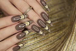 Creative French manicure in beige brown nail polish colors.