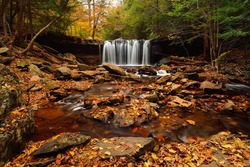 Waterfall in autumn foliage at Rickets Glen State park, Pennsylvania