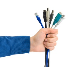 Computer cables in hand isolated on white background