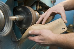 Shoemaker is repairing boot-tree