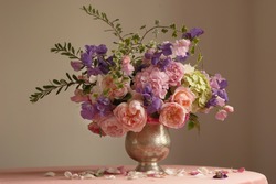 Bouquet of english roses, sweet pea  and hydrangea